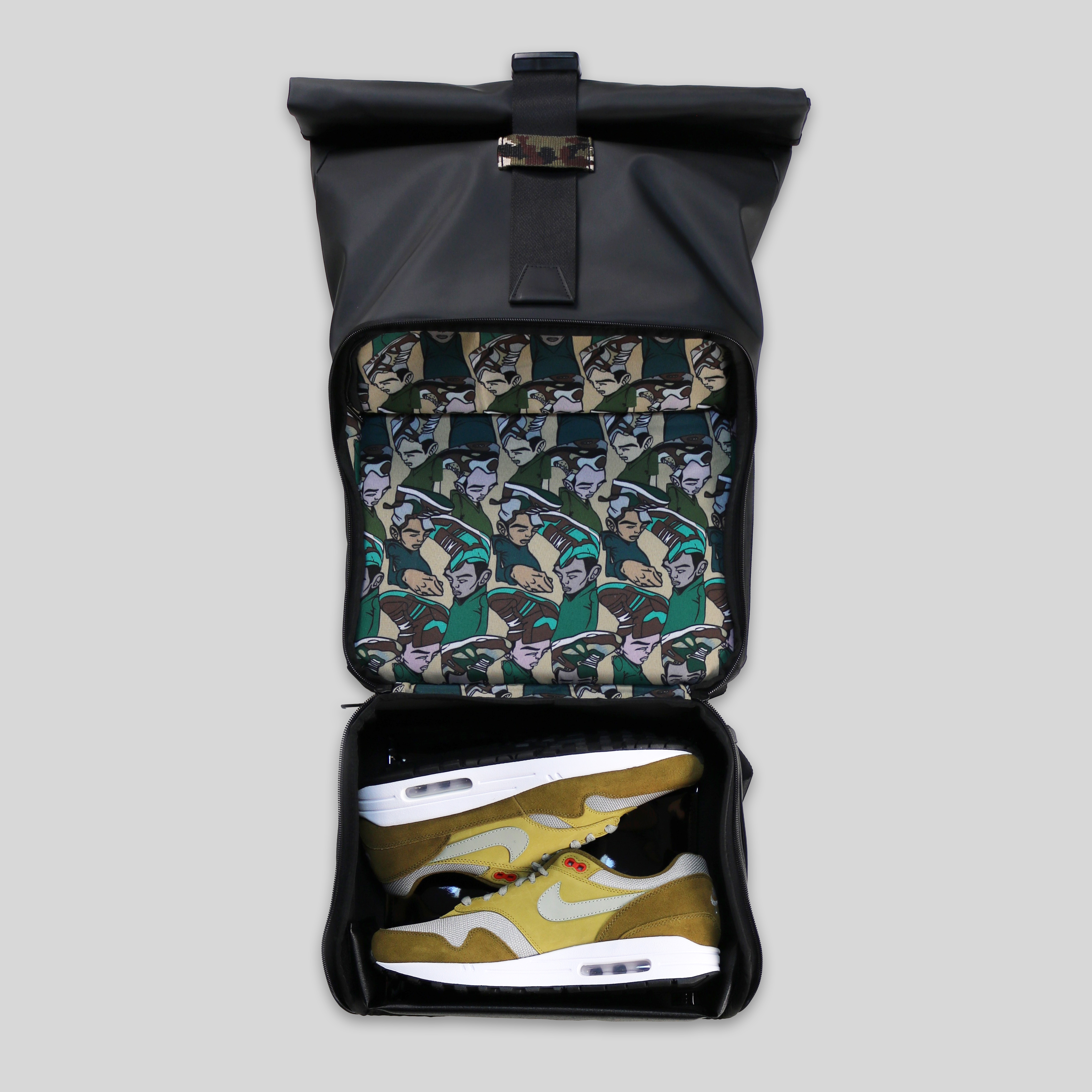 The Shrine x UP Sneakerhead Rolltop Backpack The Shrine x UP Sneakerhead Rolltop Backpack